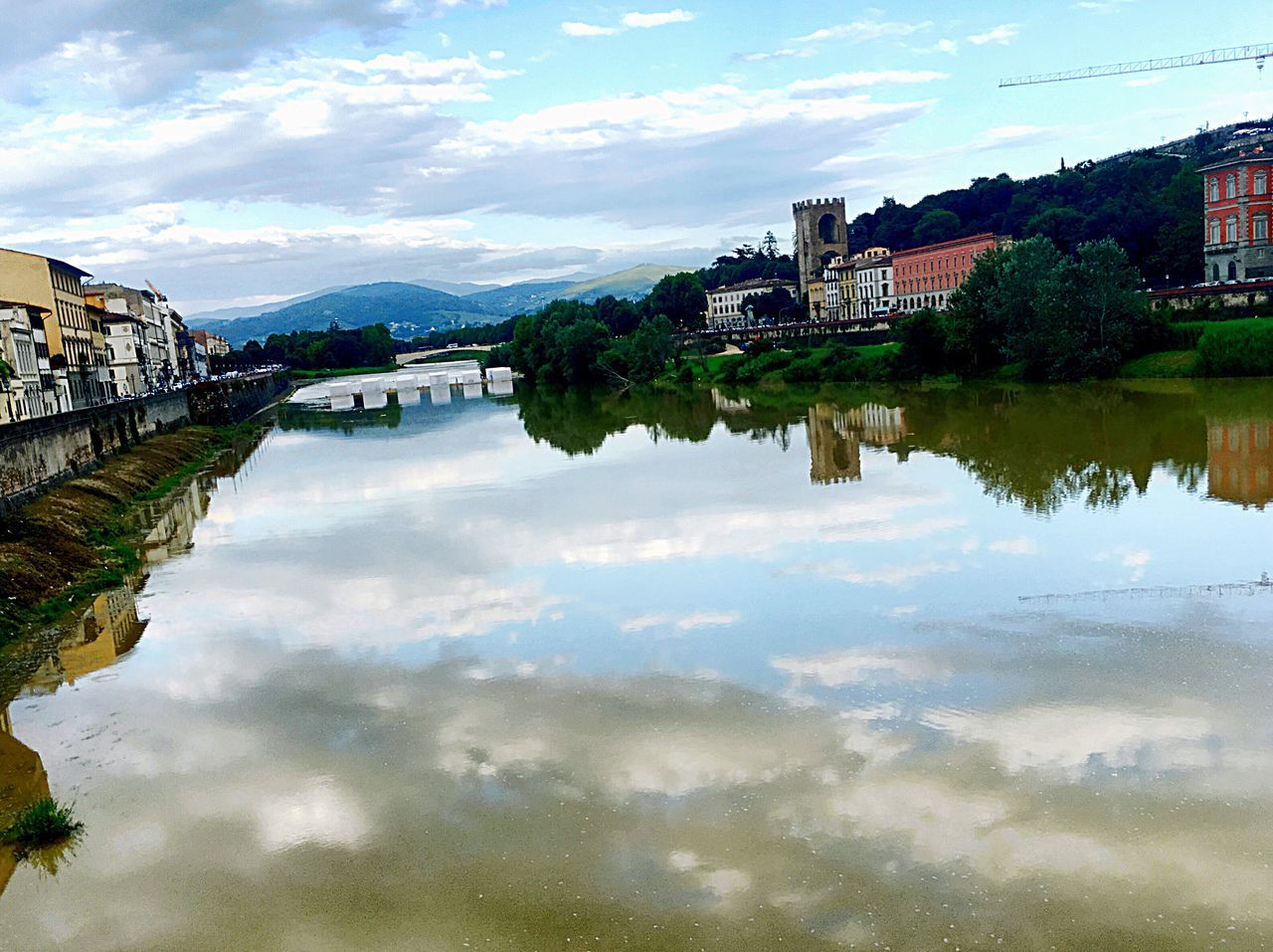 reflection, water, sky, cloud - sky, architecture, nature, built structure, building exterior, outdoors, reflection lake, lake, tree, waterfront, city, scenics, no people, beauty in nature, day, bridge - man made structure