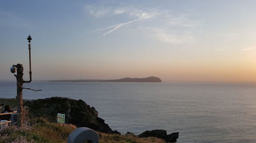 Scenic view of sea against sky at sunset