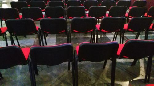 Empty chairs in row