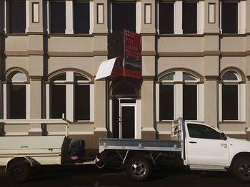 Cars parked in front of building