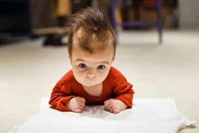 Portrait of cute baby at home