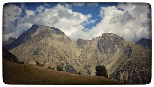 Panoramic view of landscape and mountains against sky