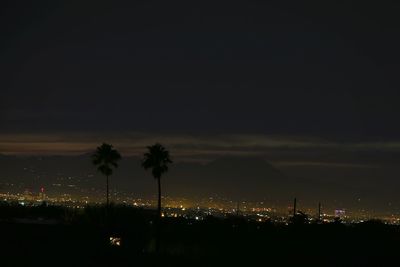 Illuminated cityscape at night