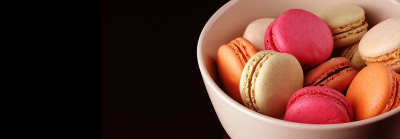 Close-up of macaroons in container