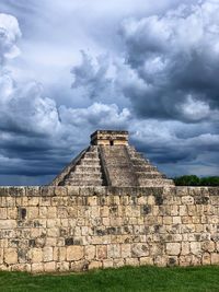 Old ruin building against cloudy sky