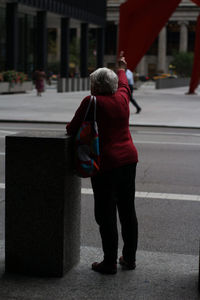 Rear view of couple standing outdoors