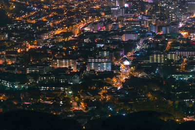 Illuminated cityscape at night