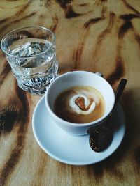 Close-up of coffee cup on table