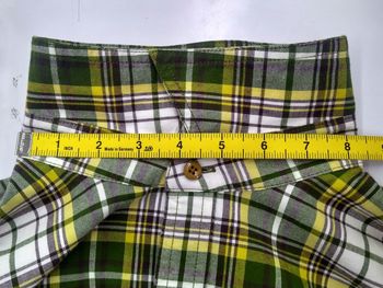 High angle view of measuring tape on shirt