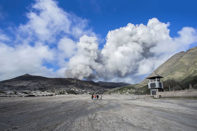 Panoramic view of volcanic landscape against sky