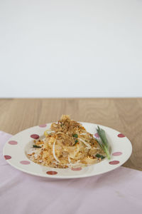 Close-up of food in plate on table