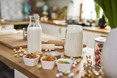 High angle view of eggs with container on table