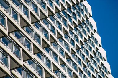 Low angle view of modern building against clear sky