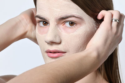 Close-up portrait of woman with face mask