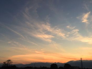 Scenic view of mountains at sunset