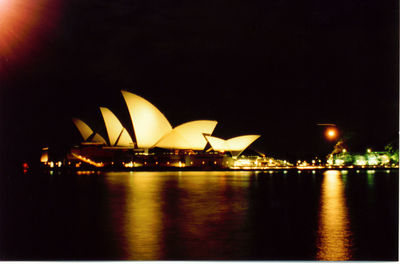 Reflection of illuminated buildings in water