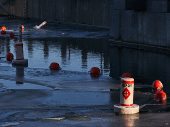 Red floating on water in lake