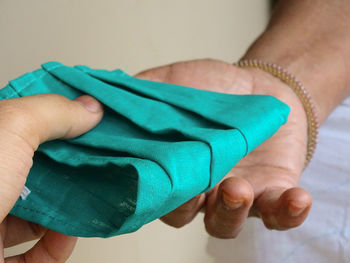 Close-up of woman holding hands