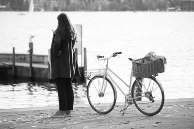 Rear view of woman walking on street