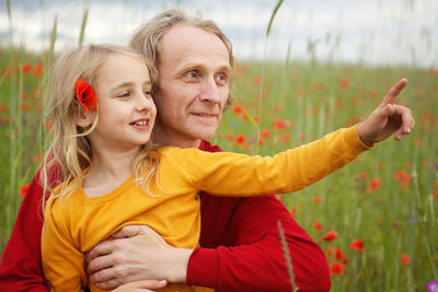 Portrait of a smiling girl on field