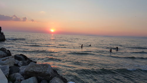 Scenic view of sea against sky during sunset