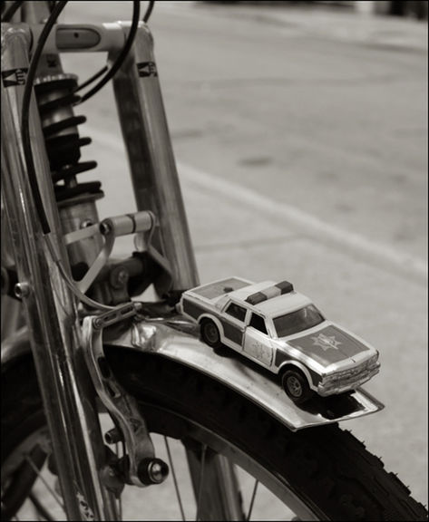 outdoors, day, no people, focus on foreground, transportation, close-up, weapon