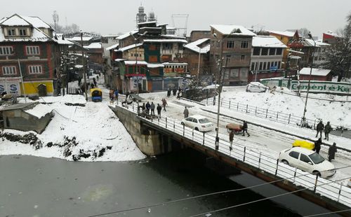 Snow covered buildings during winter