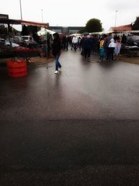 People walking on street in city