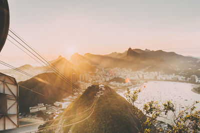 High angle view of buildings against sky during sunset