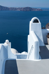 White boat by sea against sky