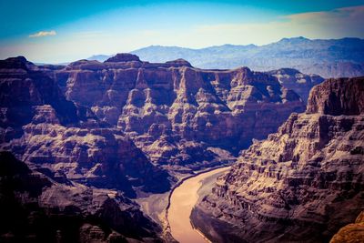 Scenic view of rocky mountains against sky