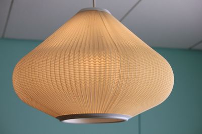 Low angle view of illuminated lamp