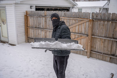 Man standing on snow covered outdoors