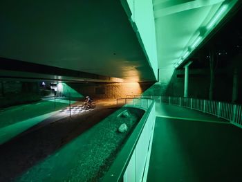 Reflection of illuminated lights in swimming pool