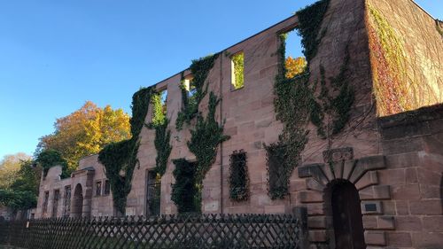 Low angle view of old building against sky