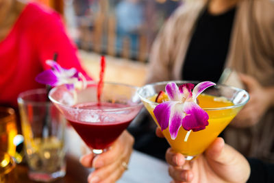 Close-up of woman holding drink