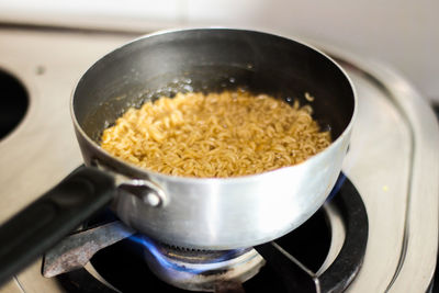 Close-up of meat in cooking pan