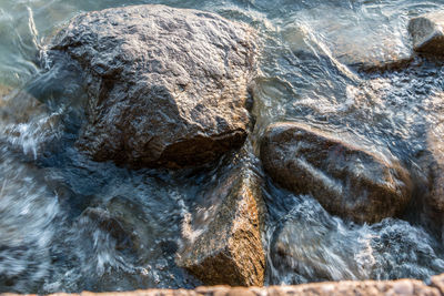 Close-up of rock formation in sea