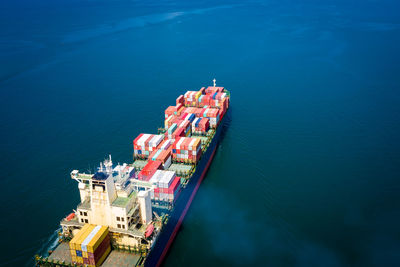 High angle view of container ship on sea