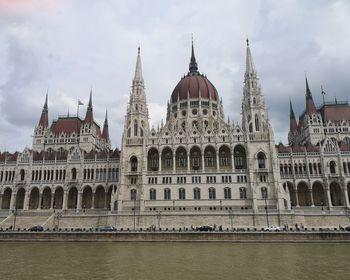 View of building against cloudy sky