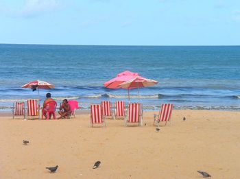 Scenic view of beach against sky