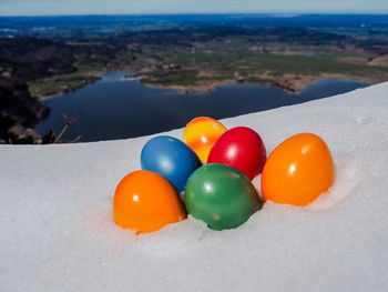 Close-up of multi colored snow on land