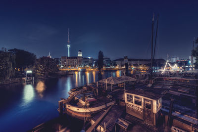 Aerial view of illuminated city at night