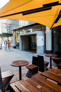 People walking on footpath in restaurant