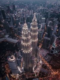 High angle view of illuminated city buildings