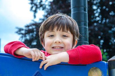 Close-up portrait of smiling boy