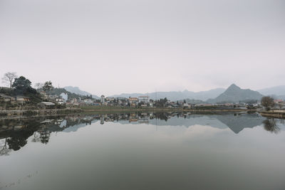 Reflection of trees in calm lake