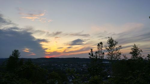 Scenic view of landscape at sunset