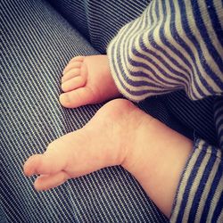 Low section of baby feet