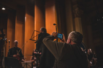 Group of people at music concert